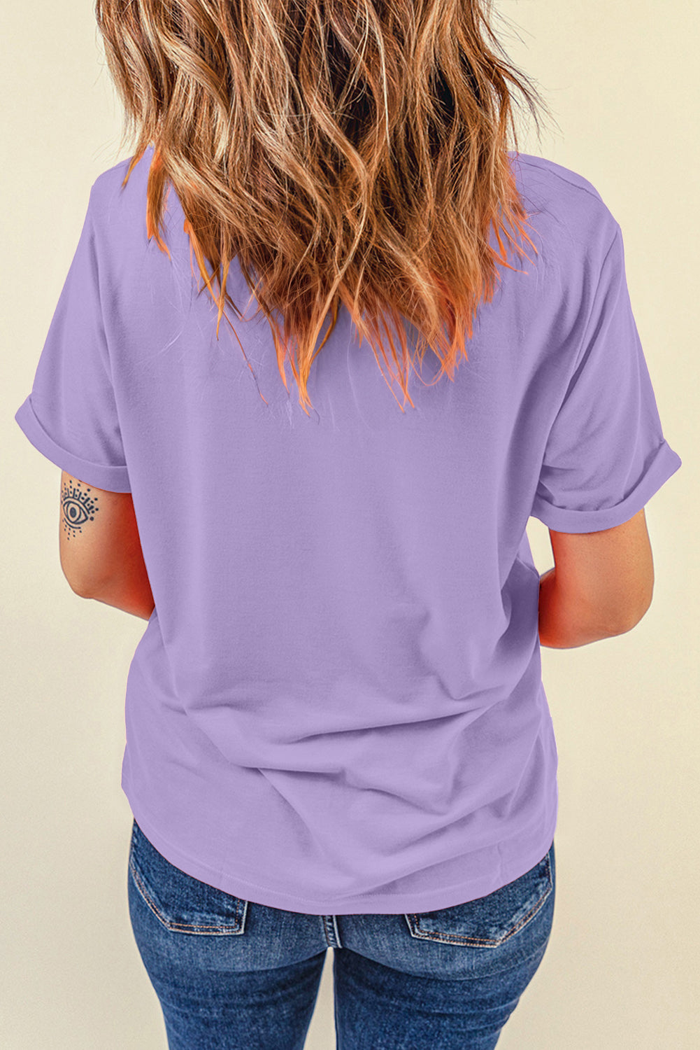 Stylish white tee with sequin Mardi Gras design perfect for parades