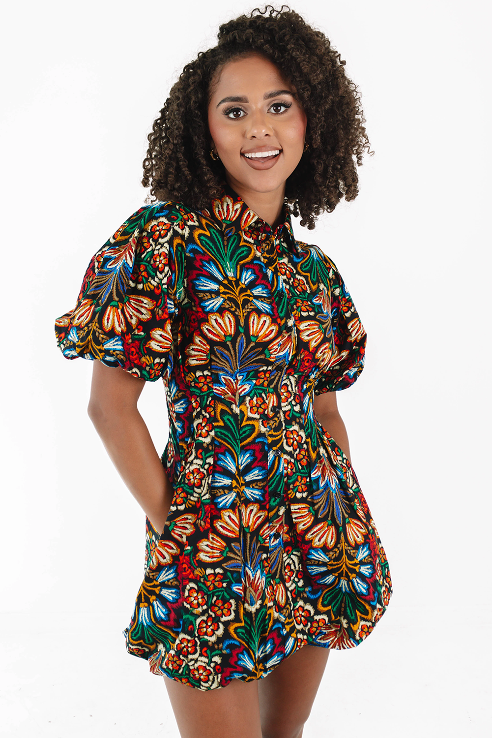 Bohemian floral dress with bubble sleeves and a flowy design