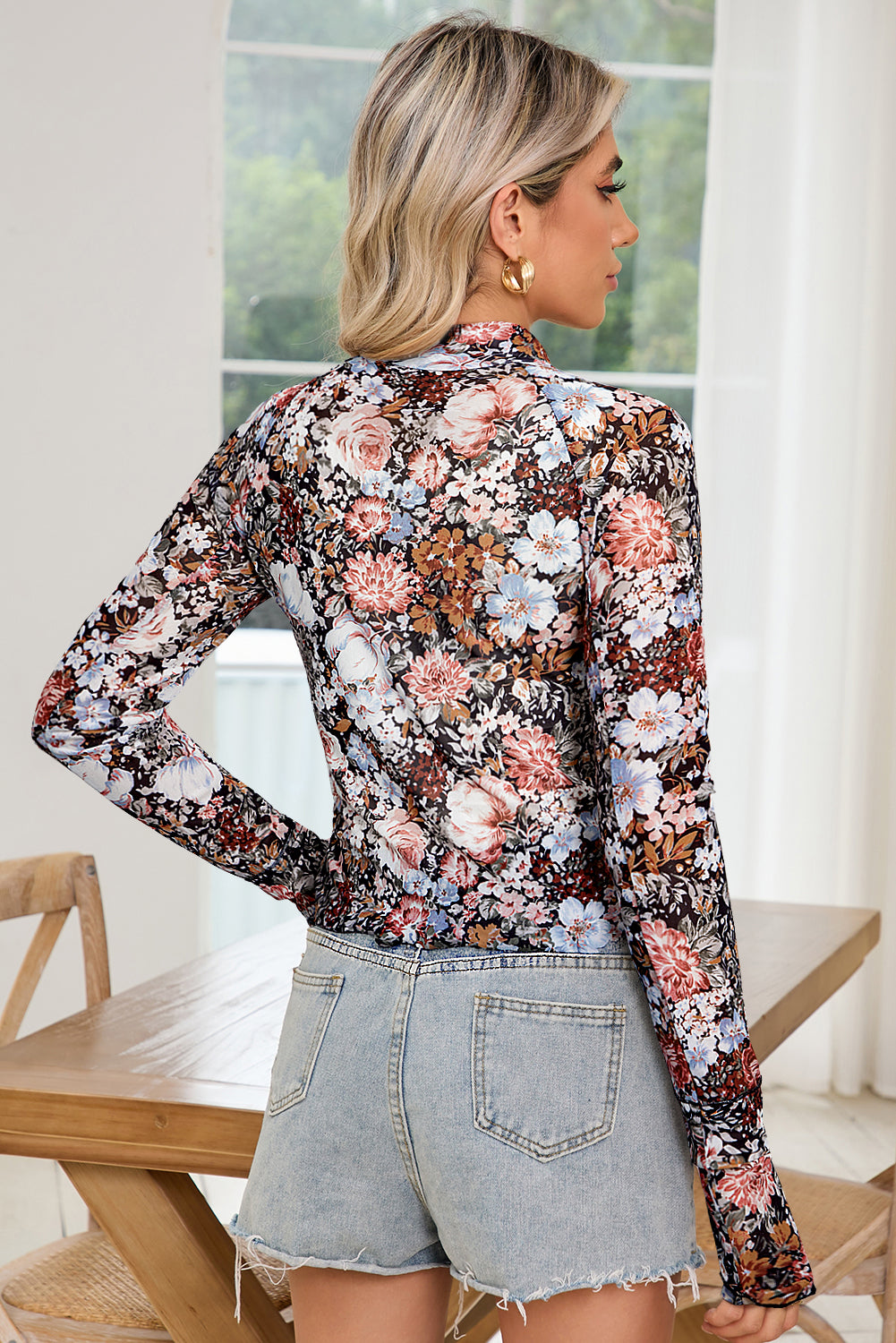Stylish brown mesh top with floral print and mock neck for a fashionable fit