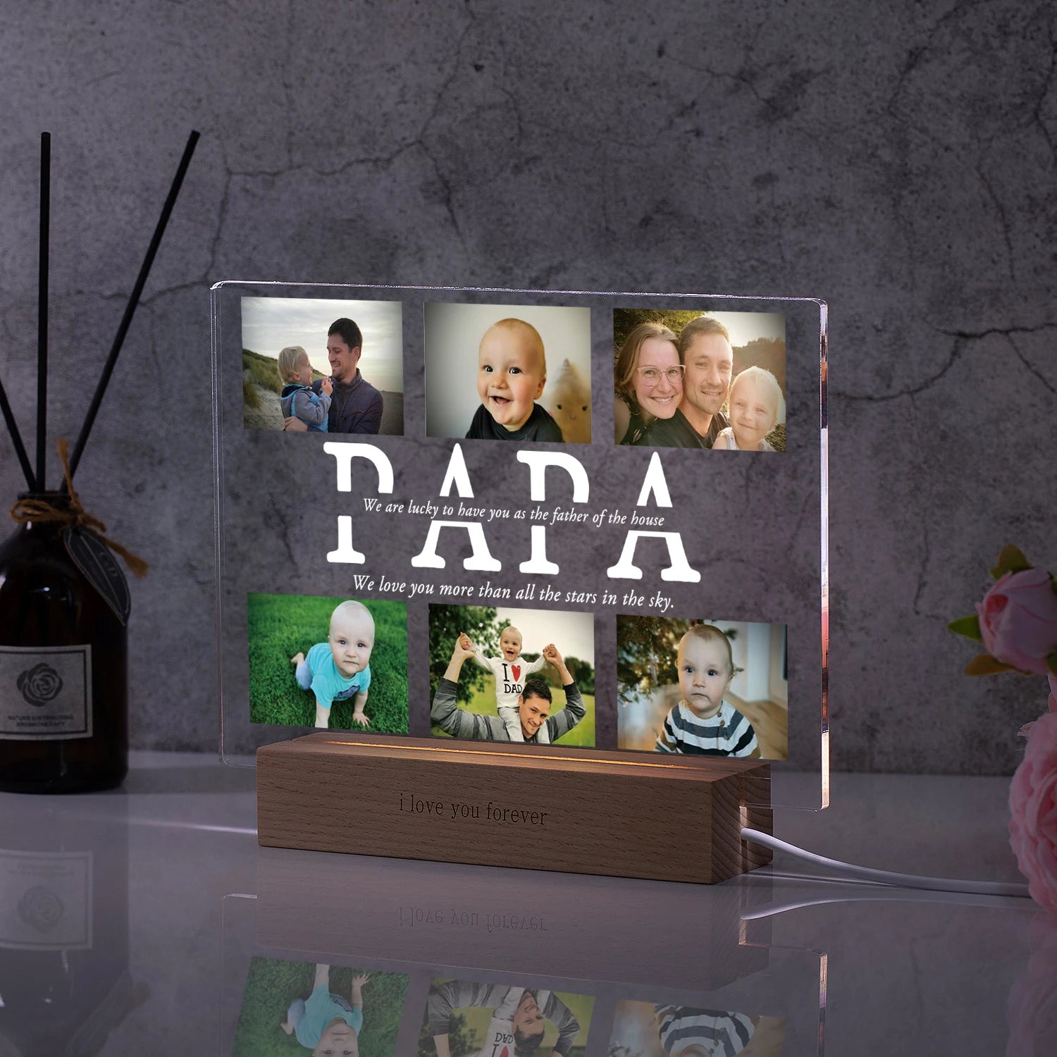Unique 3D acrylic lamp with personalized engraving on a bedside table