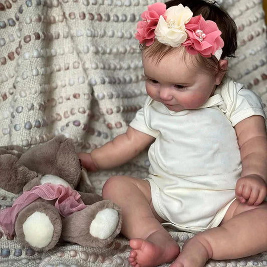 Lifelike reborn doll with vinyl body and soft limbs