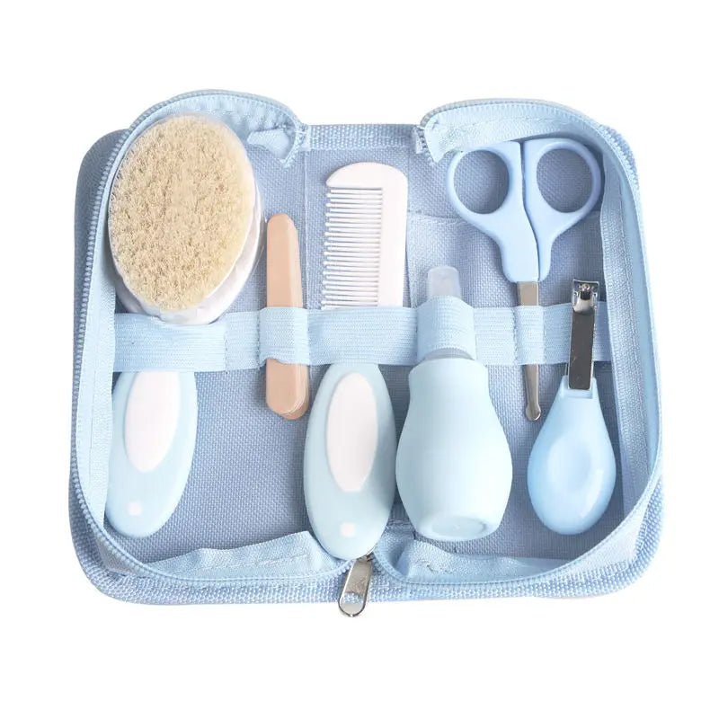 Newborn care kit including nail clippers and brush