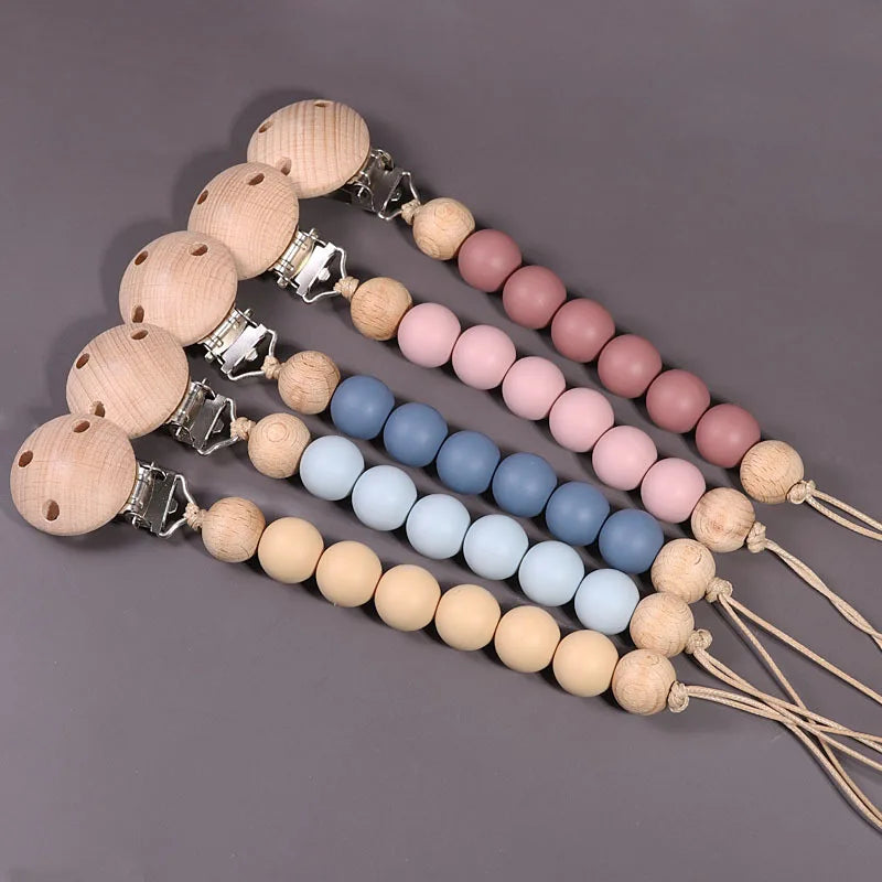 Durable wood and silicone pacifier clip for infants