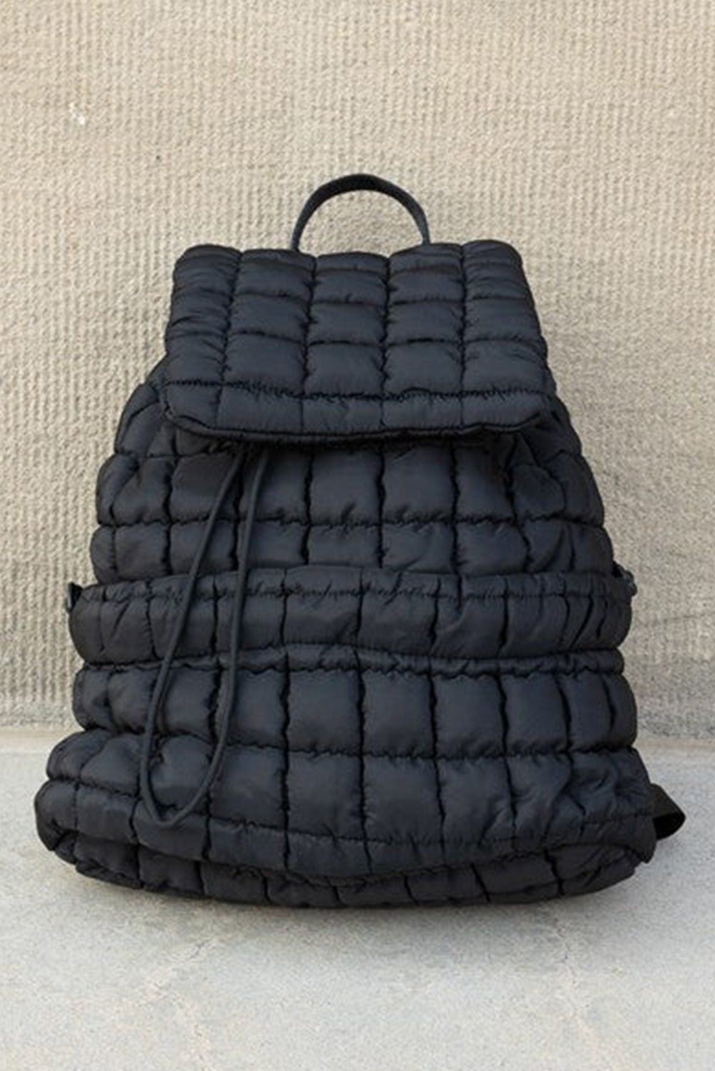 Trendy black quilted puffer backpack for daily use