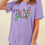 Vibrant white Mardi Gras tee with sequin accents for festive occasions