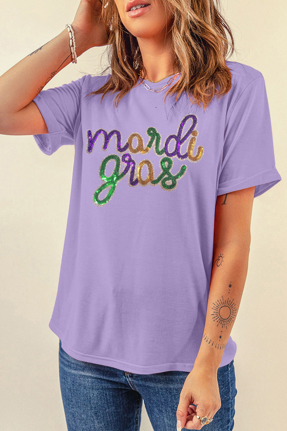 Vibrant white Mardi Gras tee with sequin accents for festive occasions