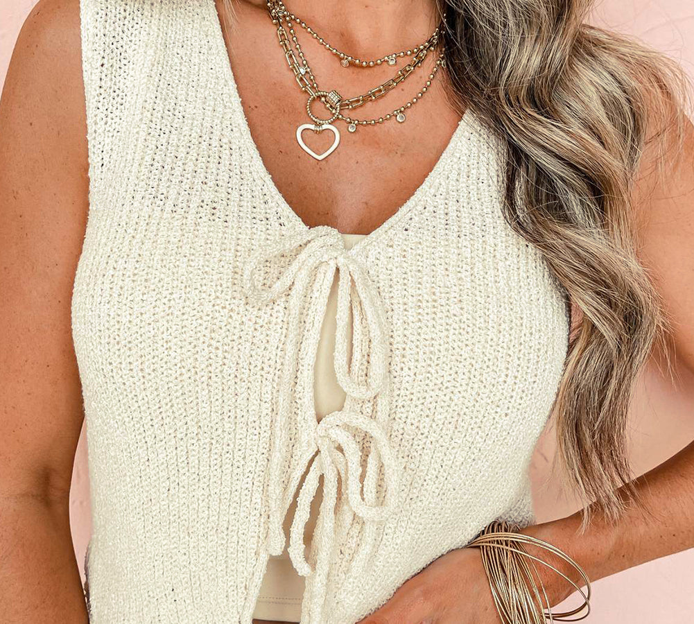 Stylish beige lace-up sweater for a chic, casual look