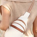 Stylish white sling bag with simple design and practical storage