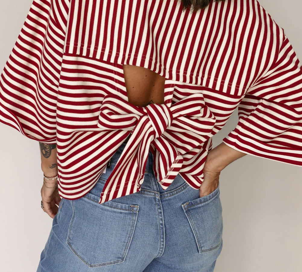 Trendy red striped women’s top with a bowknot back