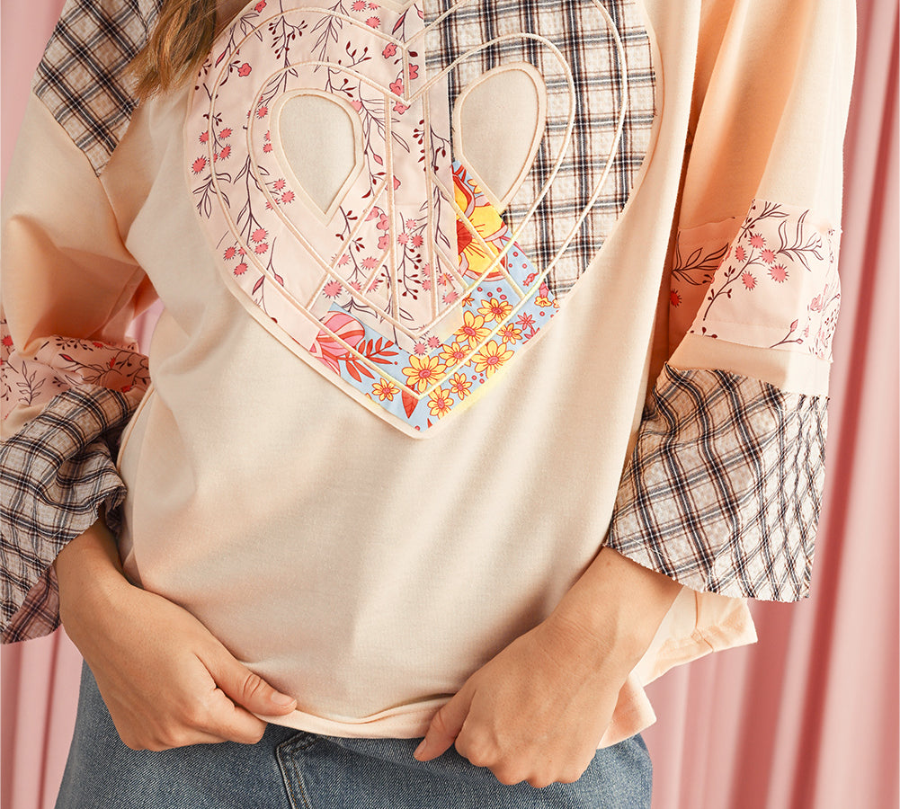 Stylish long sleeve top with plaid and floral patchwork design