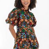 Bohemian floral dress with bubble sleeves and a flowy design