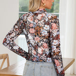 Stylish brown mesh top with floral print and mock neck for a fashionable fit