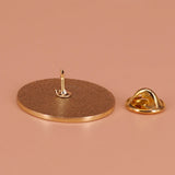 Cute tired-themed enamel lapel pin