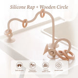 Natural wood and silicone teething toy for infants