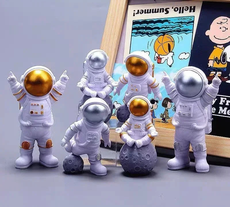 Decorative space-themed astronaut models