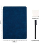 Whiteboard journal with spiral binding and markers