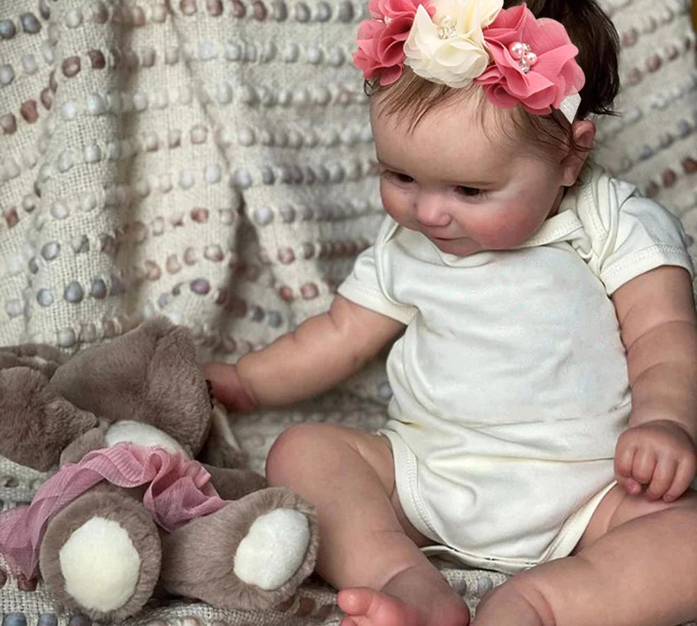 Lifelike reborn doll with vinyl body and soft limbs