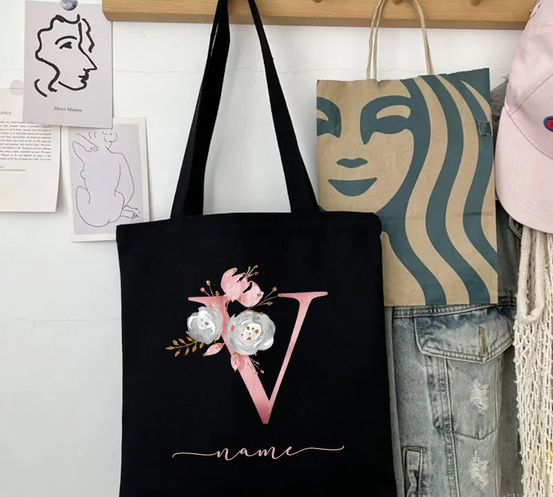 Close-up of a personalized canvas tote bag with custom initials