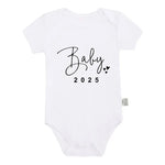 Baby 2025 bodysuit laid out for photo reveal