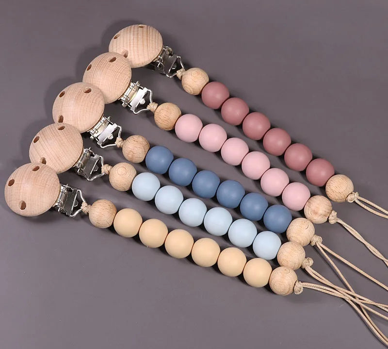 Durable wood and silicone pacifier clip for infants