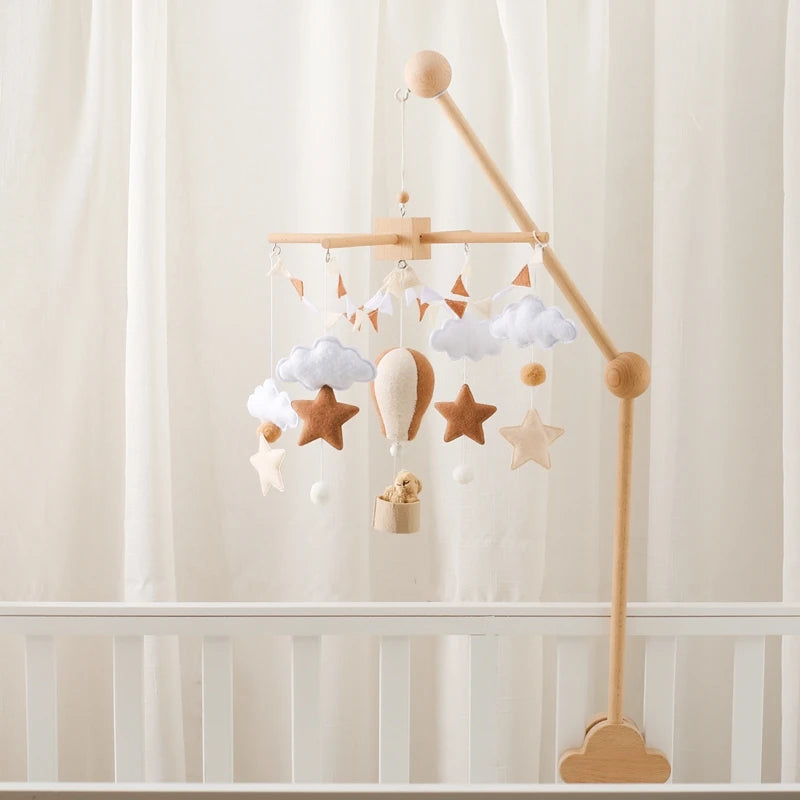 Wooden crib mobile toy with hanging figures