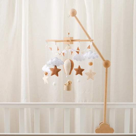 Wooden crib mobile toy with hanging figures