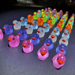 Mini glow in the dark ducks for party or decoration use