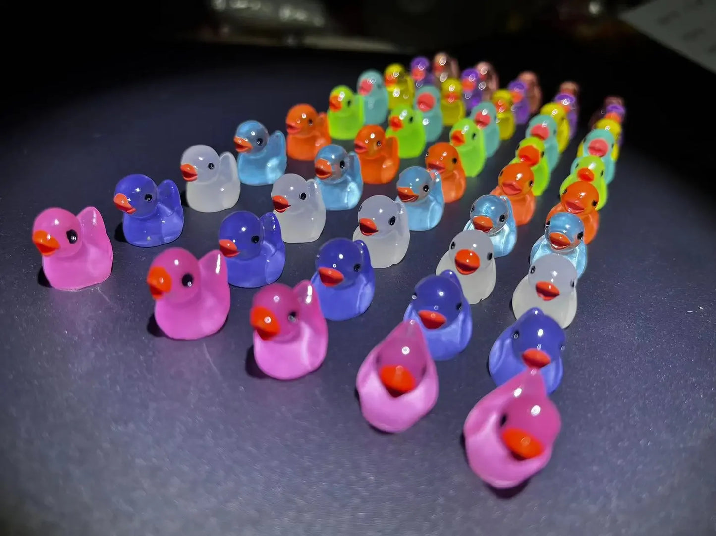 Mini glow in the dark ducks for party or decoration use