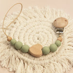 Unique and custom wooden pacifier chain with baby’s name