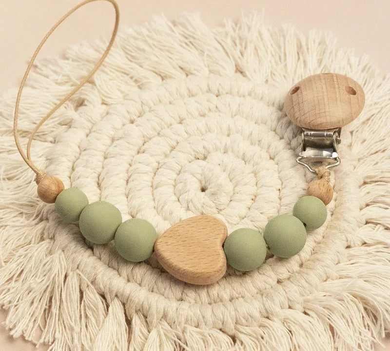 Unique and custom wooden pacifier chain with baby’s name