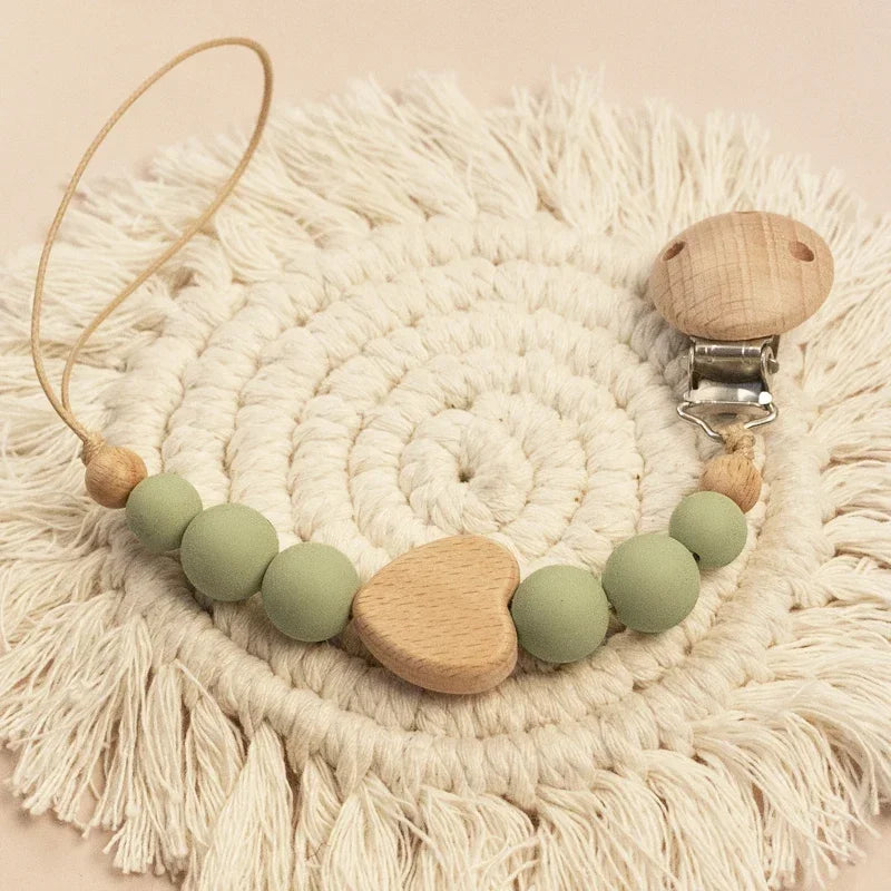 Unique and custom wooden pacifier chain with baby’s name