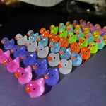 Luminous baby bath toys in duck shape glowing in dark