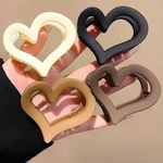 Elegant black frosted heart hair clip for stylish hairdos