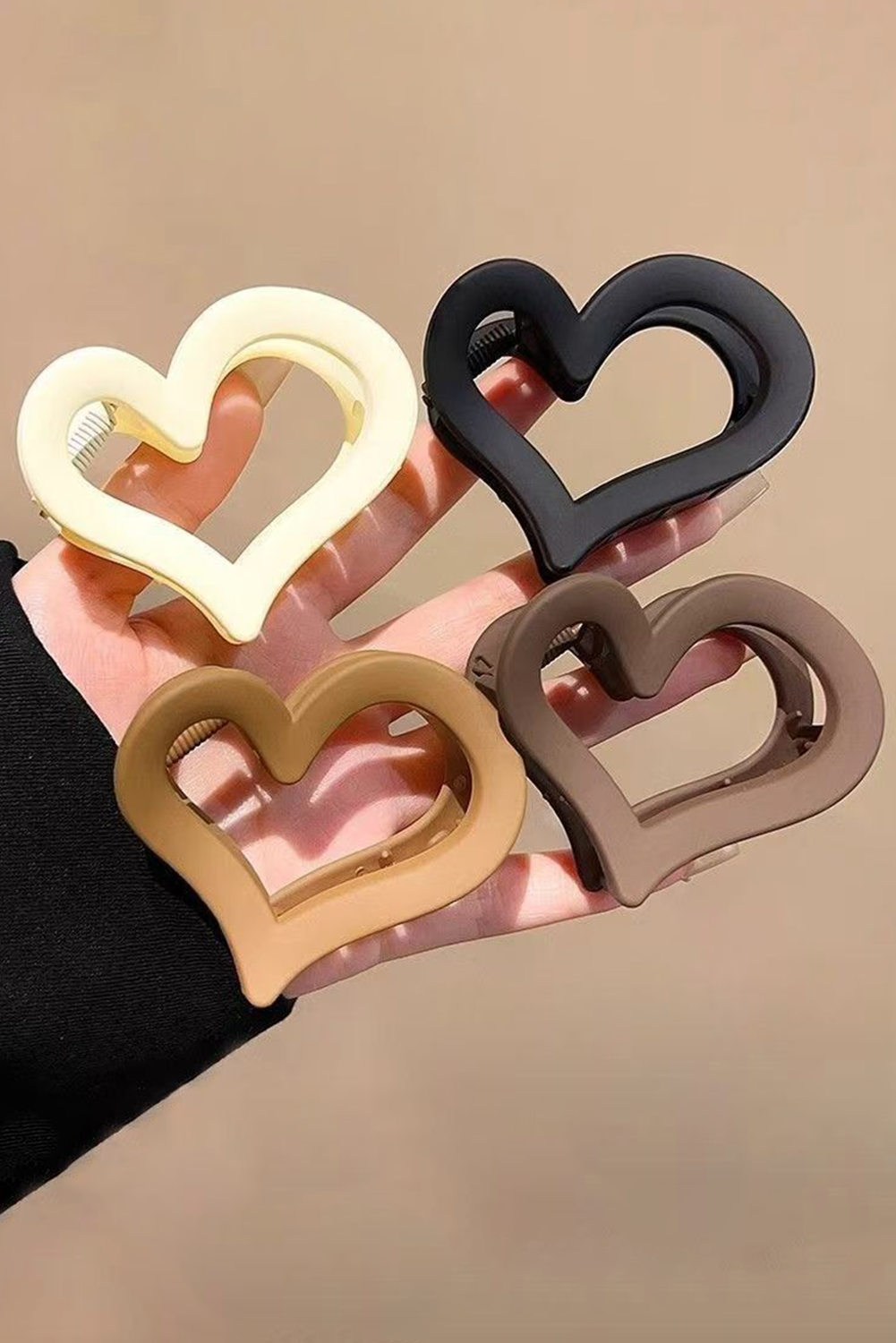 Elegant black frosted heart hair clip for stylish hairdos
