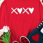 Stylish Valentine's Day sweatshirt with XOXO heart