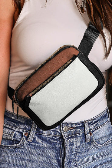 Trendy white crossbody bag featuring a unique color block pattern