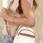 Chic white street style sling bag for a modern look